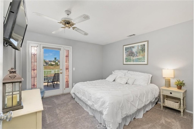 carpeted bedroom featuring ceiling fan and access to outside