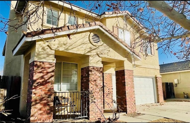 view of front of property with a garage