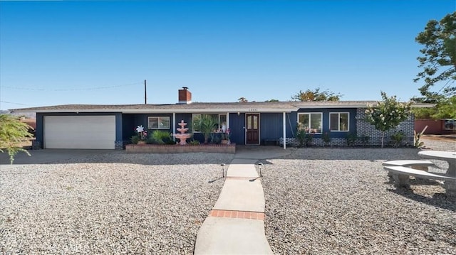 ranch-style house featuring a garage