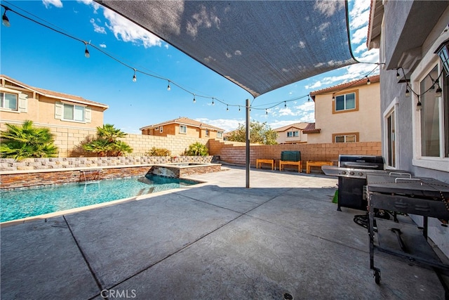 view of swimming pool featuring a patio, area for grilling, and pool water feature