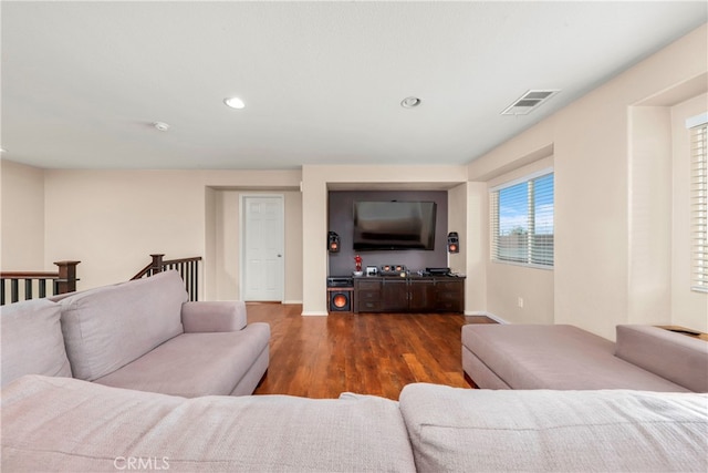 living room with dark hardwood / wood-style floors