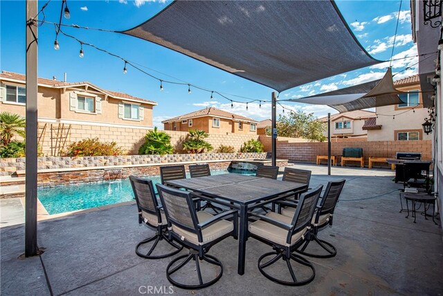 view of patio with pool water feature