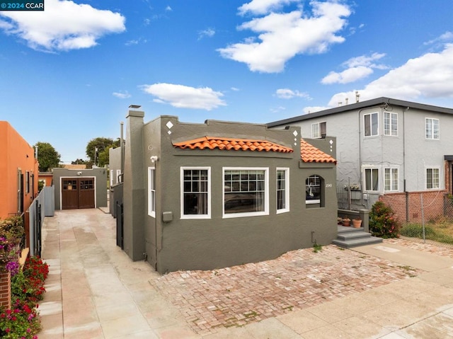 rear view of house with a patio area