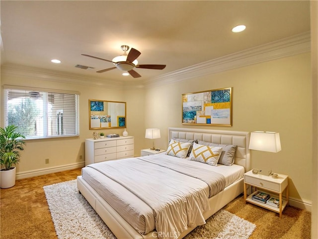 bedroom featuring ceiling fan, crown molding, and light carpet