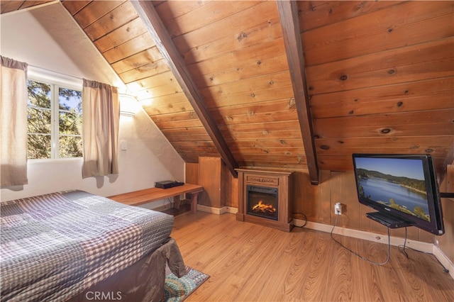 bedroom with wooden ceiling, lofted ceiling with beams, and light hardwood / wood-style flooring