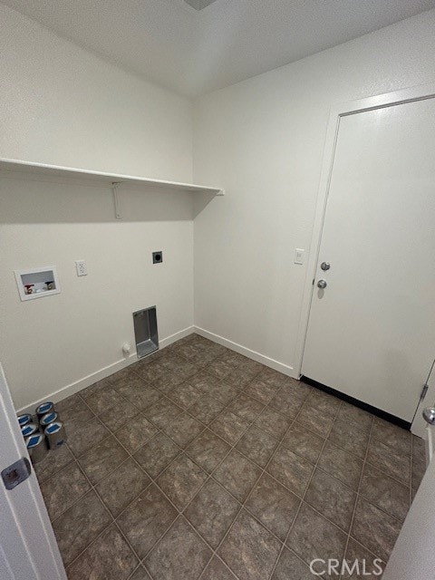 clothes washing area with washer hookup and hookup for an electric dryer