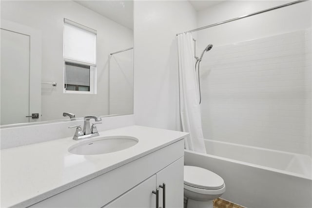 full bathroom featuring vanity, toilet, and shower / bath combo with shower curtain