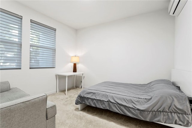 carpeted bedroom featuring a wall mounted AC