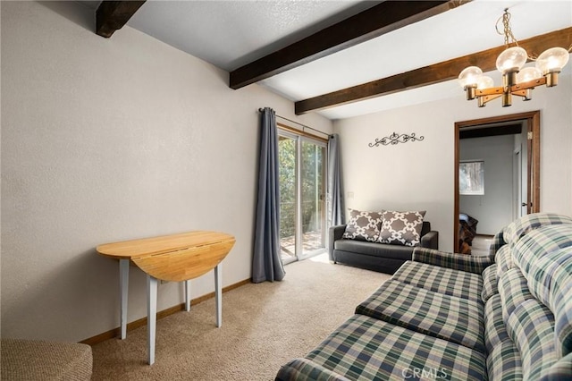 living area with a chandelier, beamed ceiling, baseboards, and carpet flooring