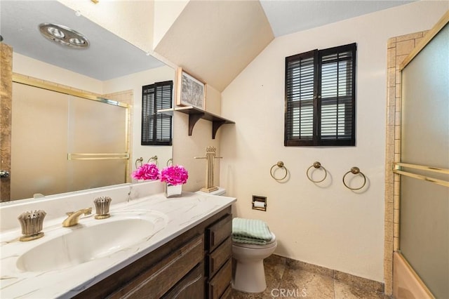 bathroom featuring vanity, toilet, lofted ceiling, bath / shower combo with glass door, and baseboards