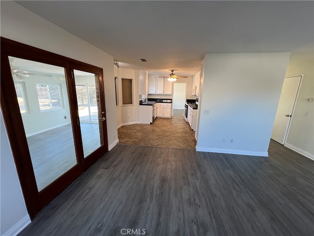 interior space with dark hardwood / wood-style floors