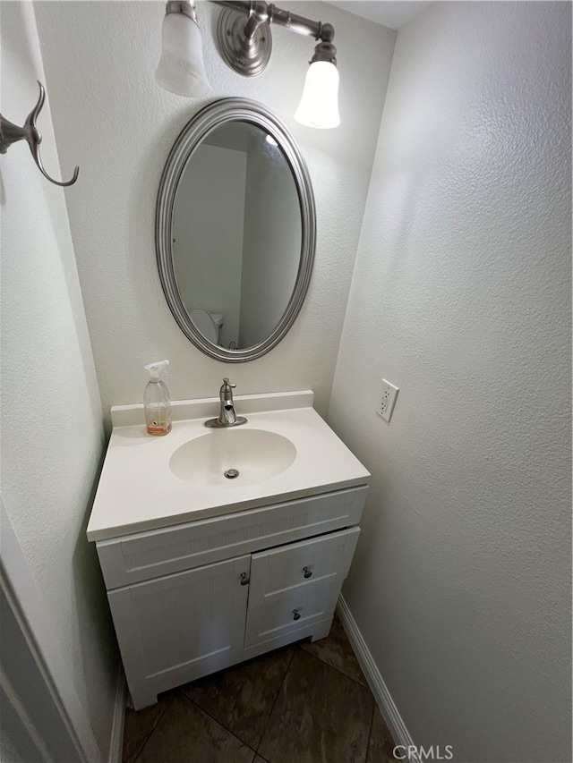 bathroom featuring vanity and tile patterned flooring