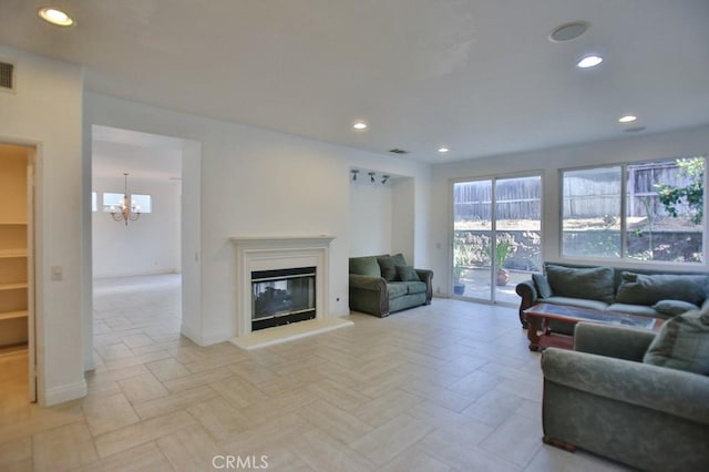 living room featuring an inviting chandelier