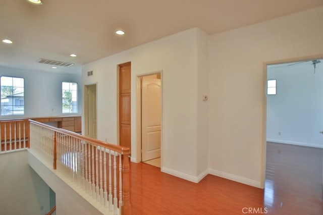 hallway featuring hardwood / wood-style floors