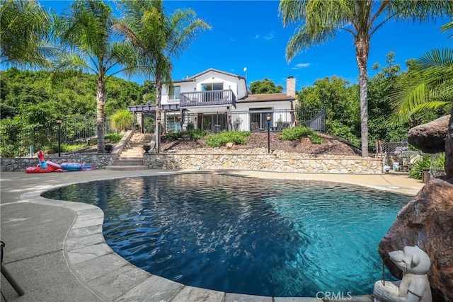 view of pool featuring a patio