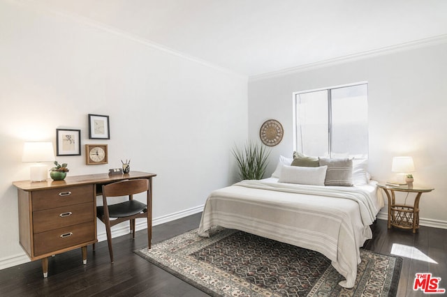 bedroom with crown molding and dark wood-type flooring