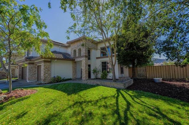 view of front of house with a front yard