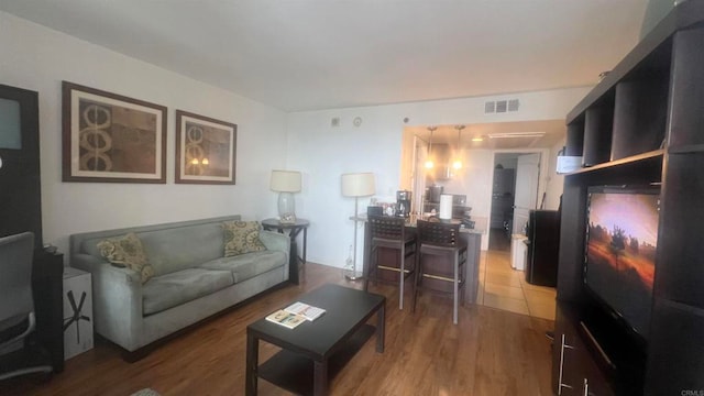 living room with hardwood / wood-style flooring