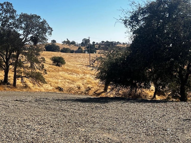 view of street featuring a rural view