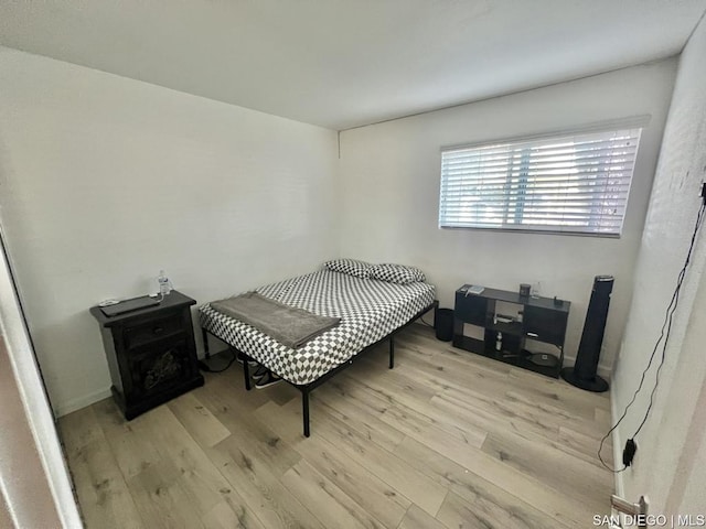 bedroom featuring light wood-type flooring