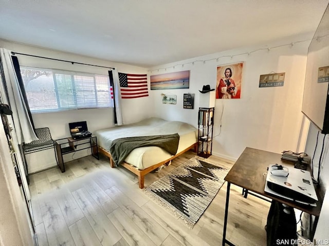 bedroom featuring light hardwood / wood-style floors