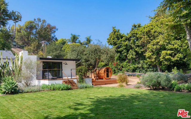 view of yard with a wooden deck