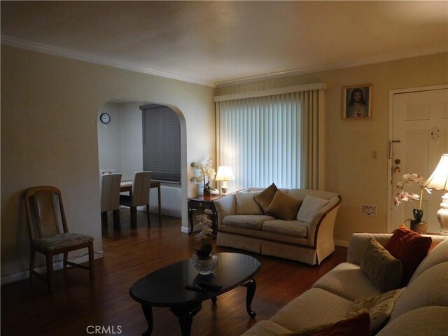 1415 Ximeno Ave, Long Beach, CA 90804 - living room featuring arched walkways, crown molding, wood finished floors, and baseboards
