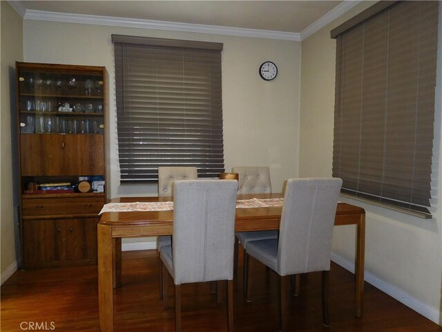 1415 Ximeno Ave, Long Beach, CA 90804 - dining area featuring crown molding, wood finished floors, and baseboards