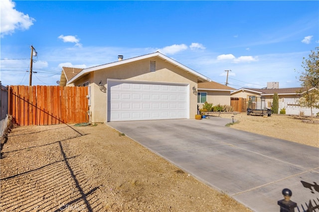 single story home with a garage