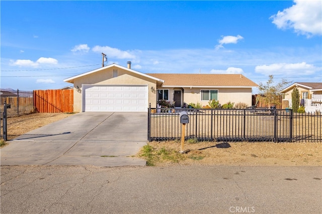 ranch-style house featuring a garage