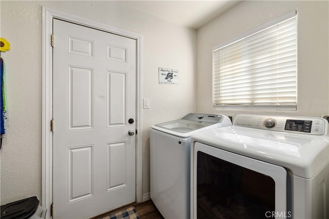 washroom with washer and clothes dryer