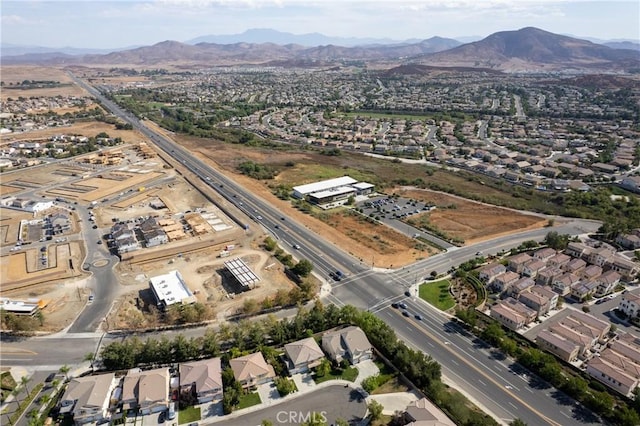 birds eye view of property with a residential view and a mountain view