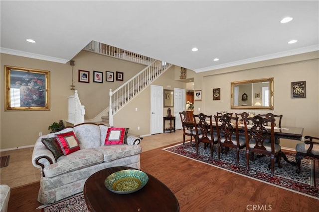 living room featuring light wood finished floors, recessed lighting, stairway, ornamental molding, and baseboards