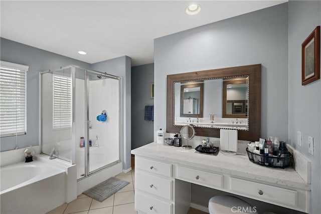 full bathroom featuring recessed lighting, tile patterned floors, a shower stall, vanity, and a bath