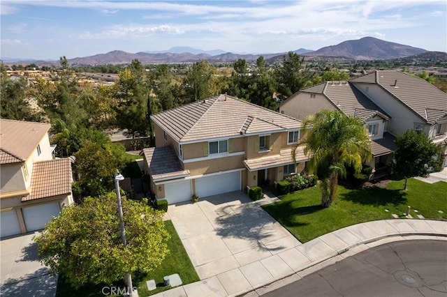 drone / aerial view with a mountain view and a residential view