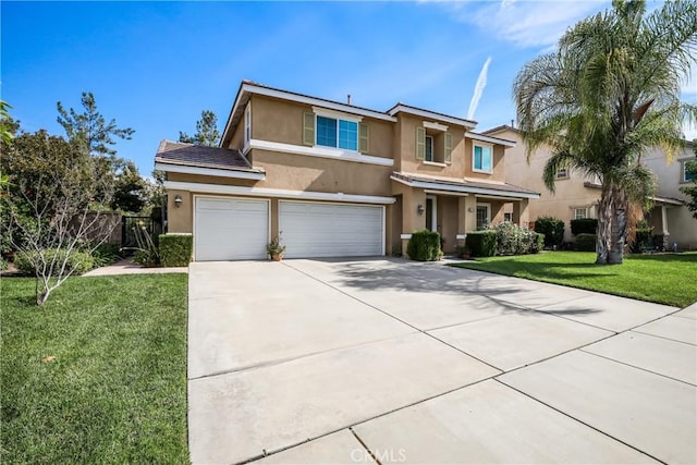 view of front of home featuring a front lawn, concrete driveway, fence, a garage, and stucco siding