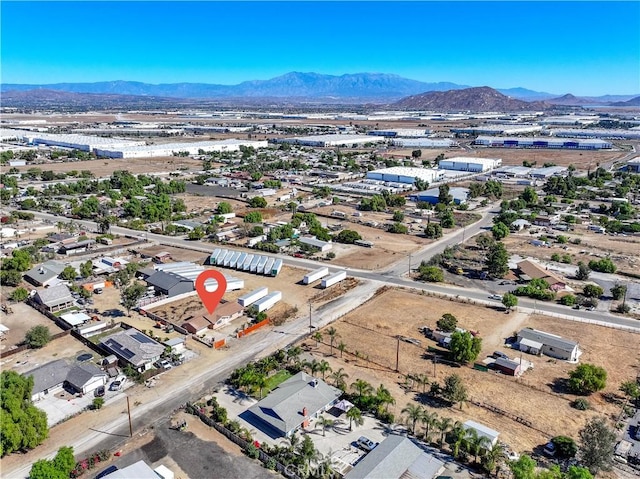 drone / aerial view featuring a mountain view