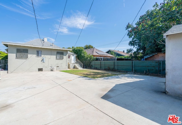 rear view of house with a patio area