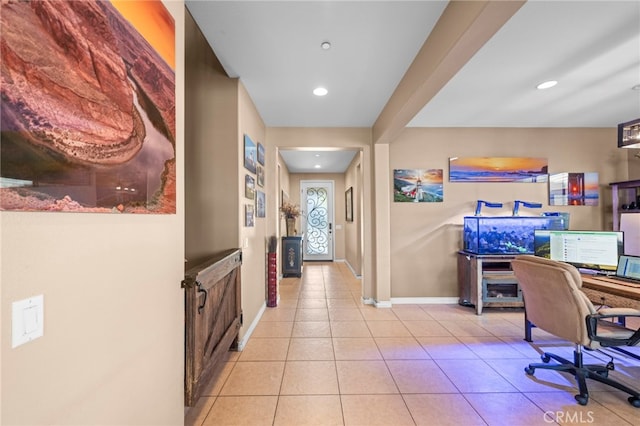 corridor with light tile patterned floors