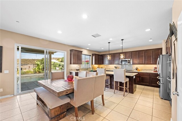 view of tiled dining space