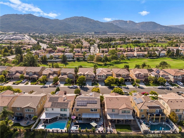 bird's eye view with a mountain view