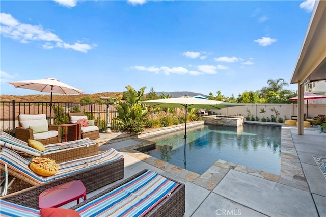 view of swimming pool featuring an outdoor living space, a patio area, and an in ground hot tub