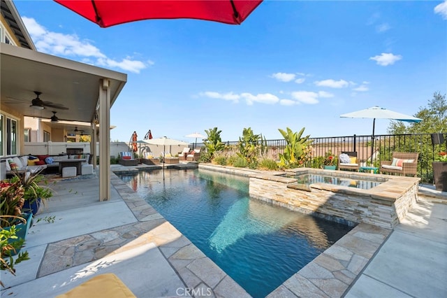 view of pool featuring an in ground hot tub, an outdoor living space, ceiling fan, and a patio