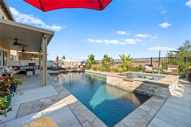 view of swimming pool featuring an in ground hot tub, ceiling fan, an outdoor hangout area, and a patio area