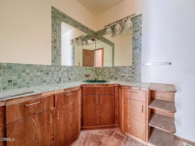 bathroom with decorative backsplash and vanity