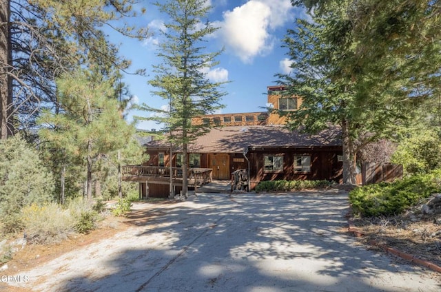 view of front of house featuring a wooden deck