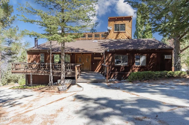 view of front of house featuring a deck