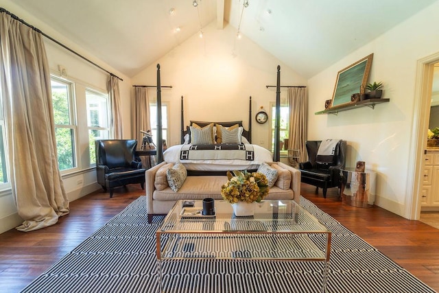 bedroom with lofted ceiling with beams and dark wood-type flooring