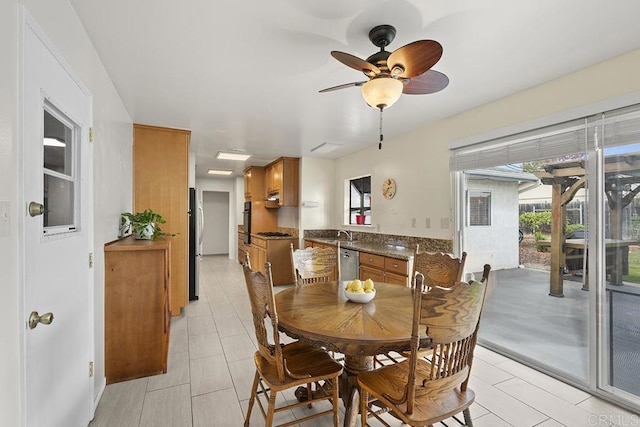 dining area with ceiling fan