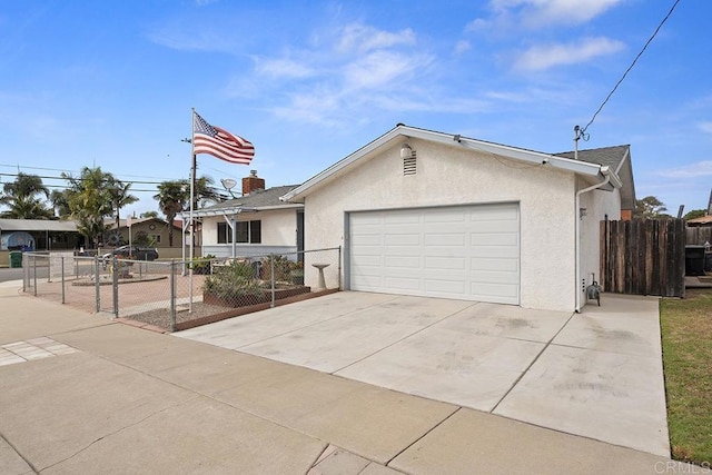 ranch-style house featuring a garage